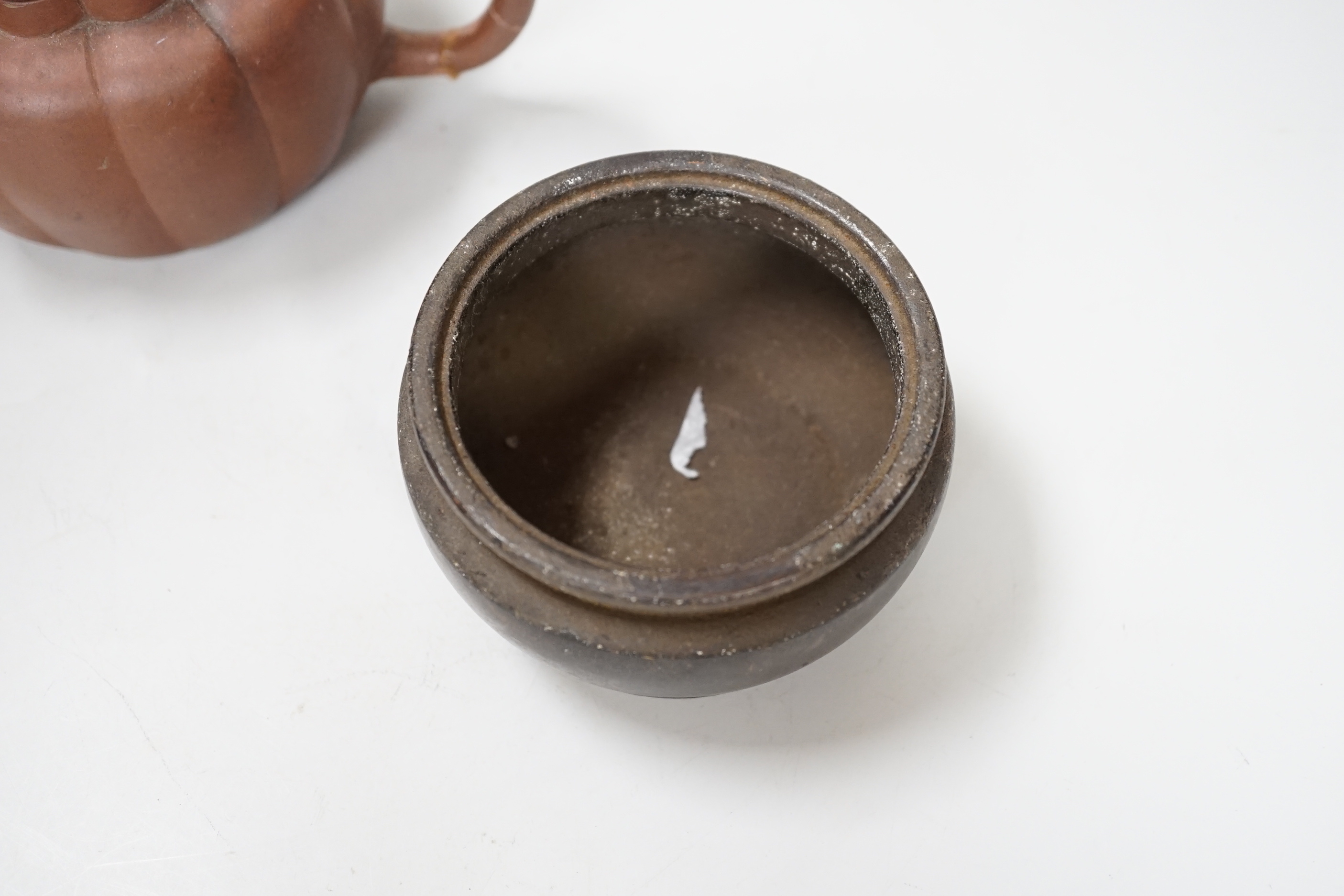 A Chinese Yixing teapot and a bronze censer, teapot 10 cm high